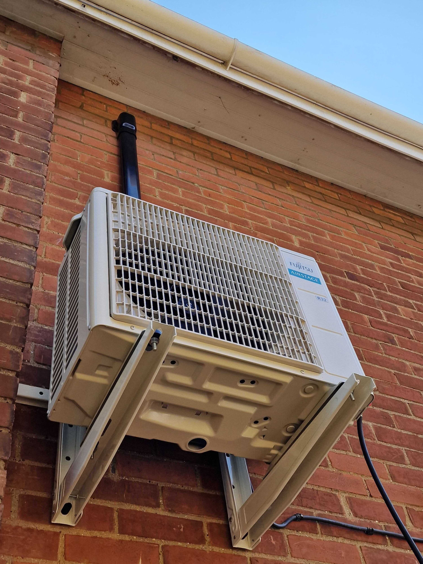 External air conditioning condenser unit inspected by a Georgio's engineer