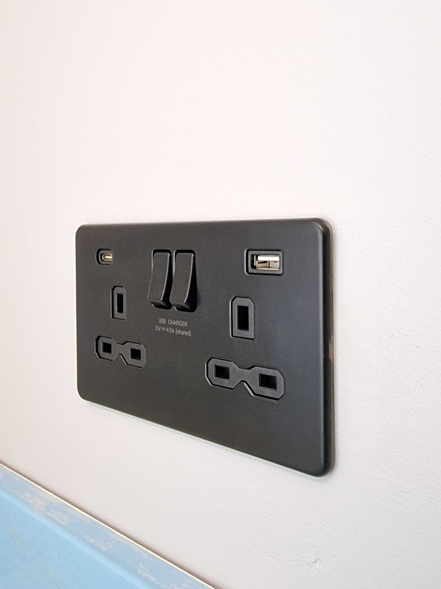 Matt black double USB plug socket installed by Georgio's electricians in Hockley, Essex
