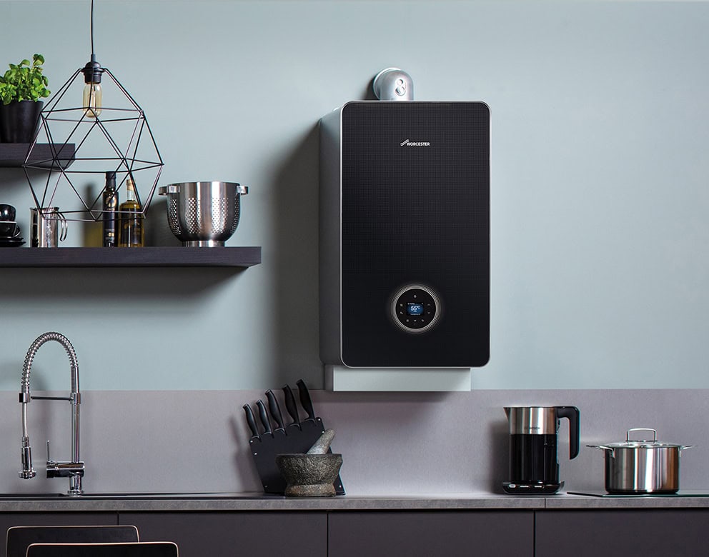 Modern Worcester Bosch combi boiler installed neatly in a kitchen