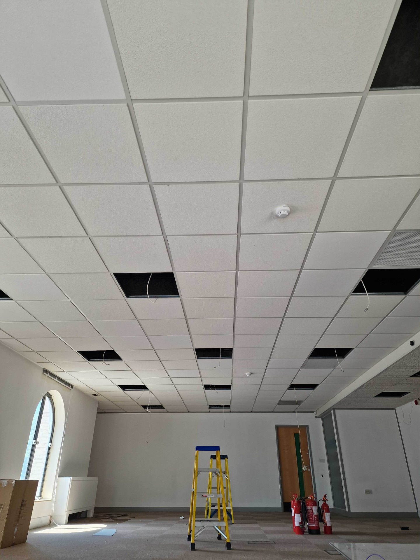 Modern office building — commercial electrical services by Georgio's