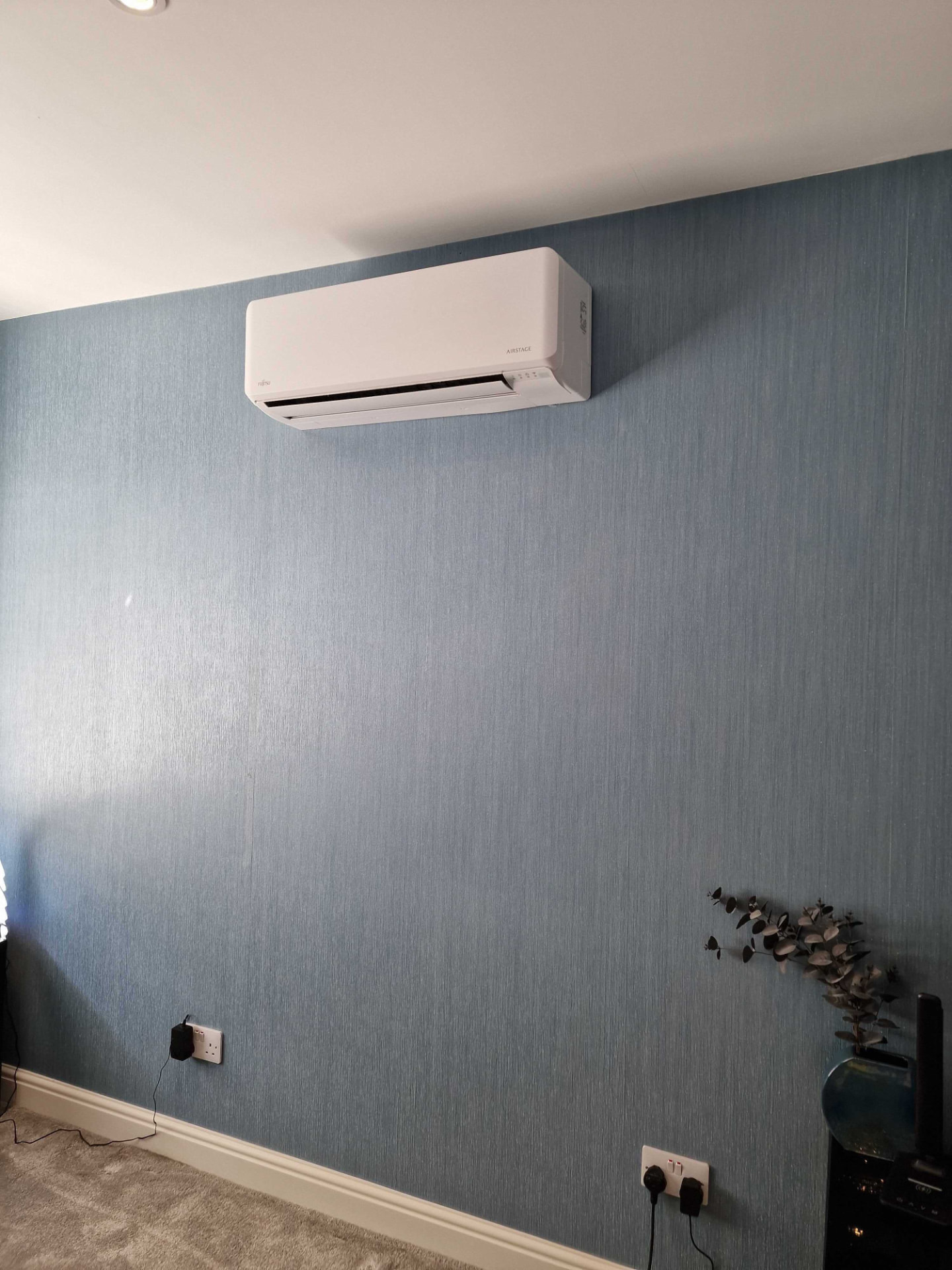 Wall-mounted air conditioning unit installed by Georgio's in Thorpe Bay, Essex