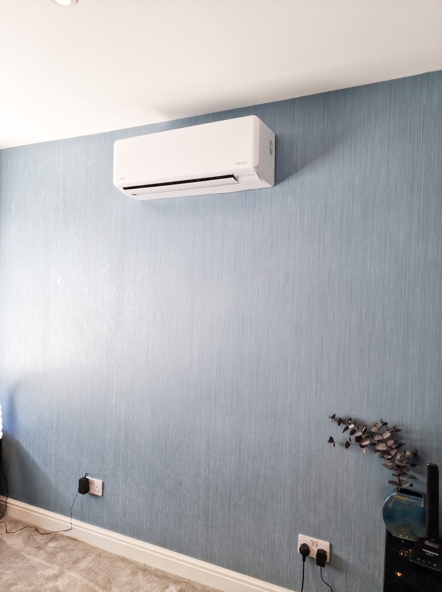 Wall-mounted air conditioning unit installed in a South Essex home