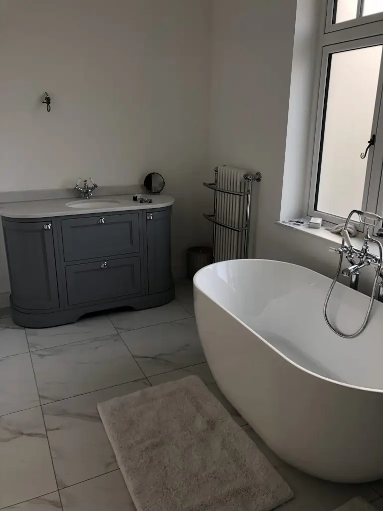 Modern, clean bathroom installed by Georgio's