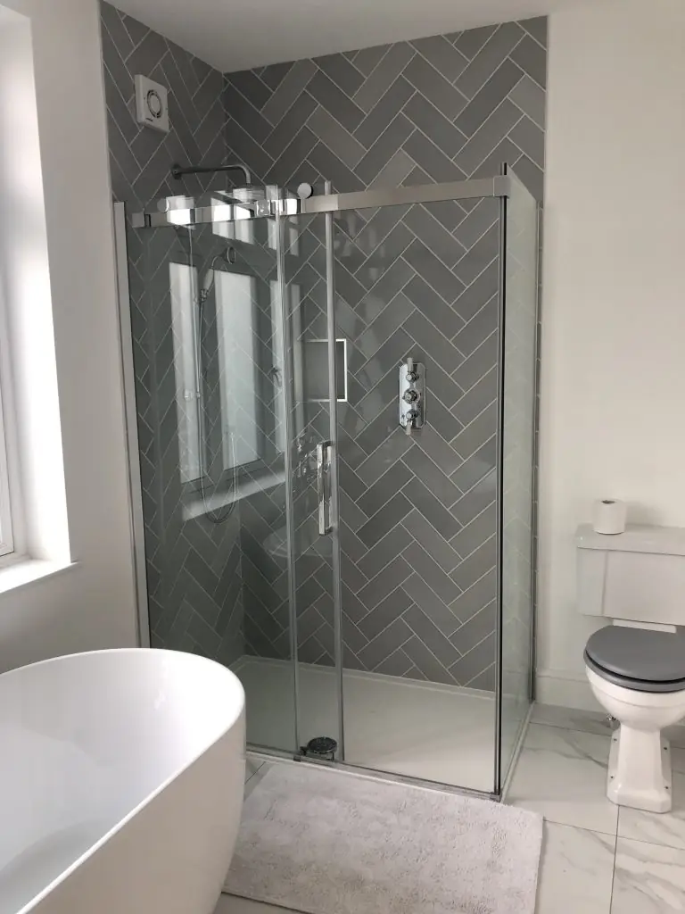 Newly installed shower in modern bathroom by Georgio's