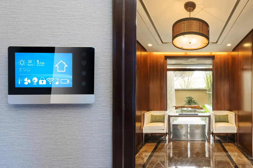 Installed smart thermostat solution on the wall of home